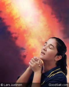 Woman prays i the presence of Fire of God.