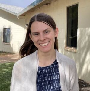 Woman Smiling into Camera