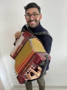 Nelson Playing an Accordian