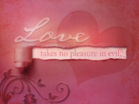 A Sign that Says "Love Takes No Pleasure in Evil"