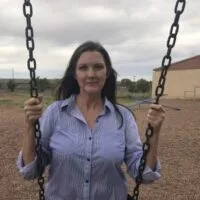 Diana Fish Sitting on a Swing