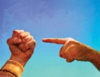 Finger Pointing to a Fist