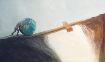 A man struggles as he pushes the world over a cross bridge